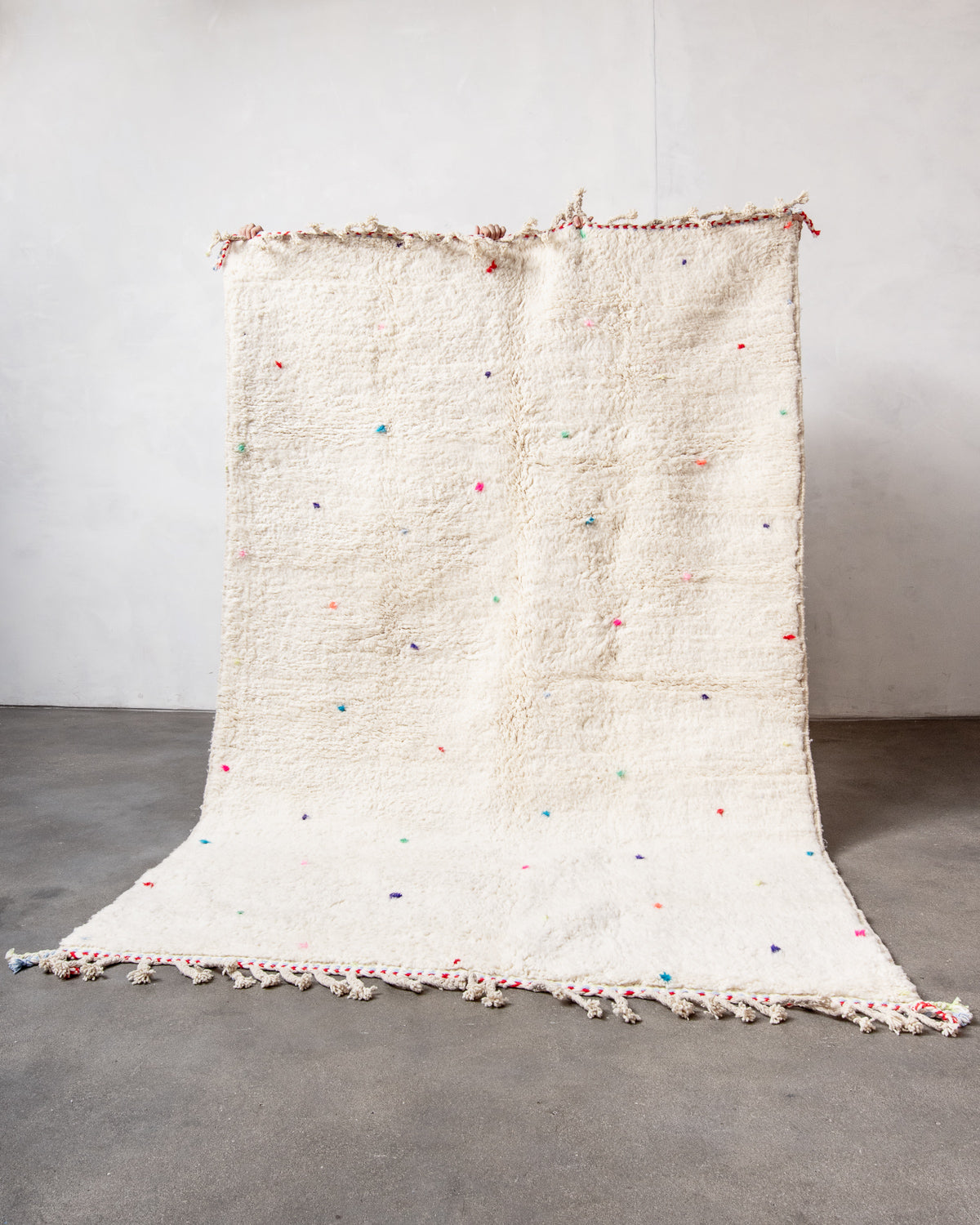 Modern, designer, handcrafted Berber rug from Morocco. Beniourain carpet with beautiful colours and patterns and fluffy wool texture.